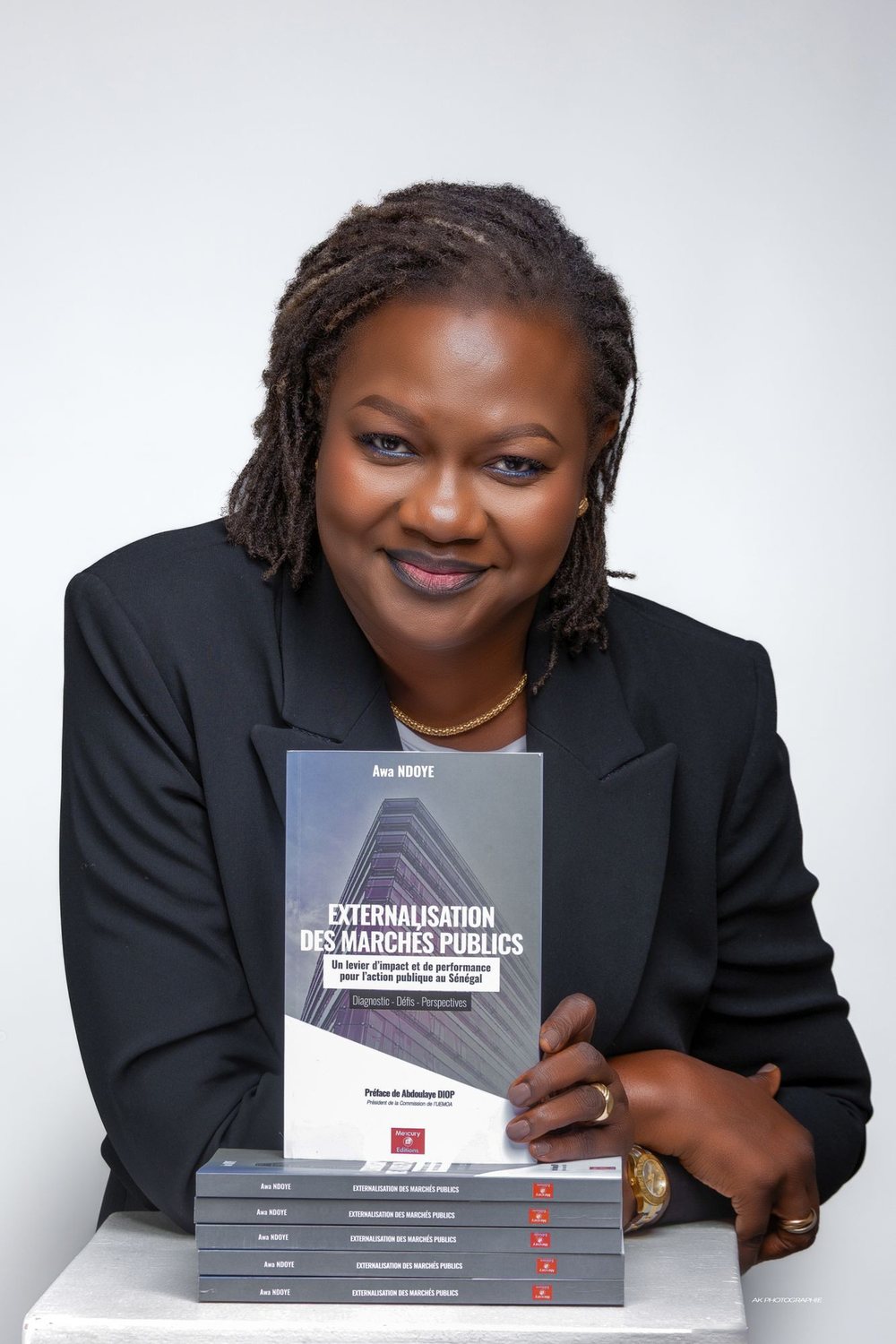 Awa NDOYE presenting her book “Externalisation des marchés publics”
